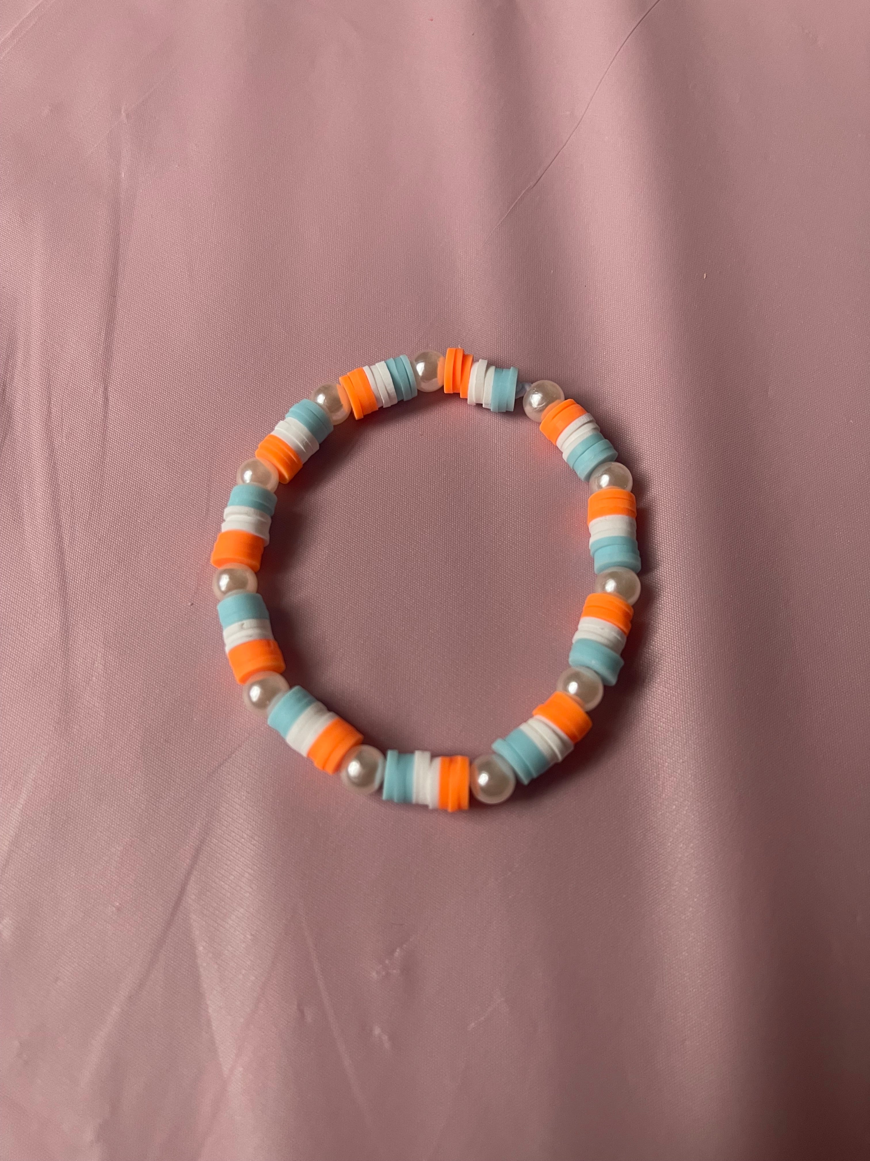 #193 Light Blue,White & Orange Bracelet