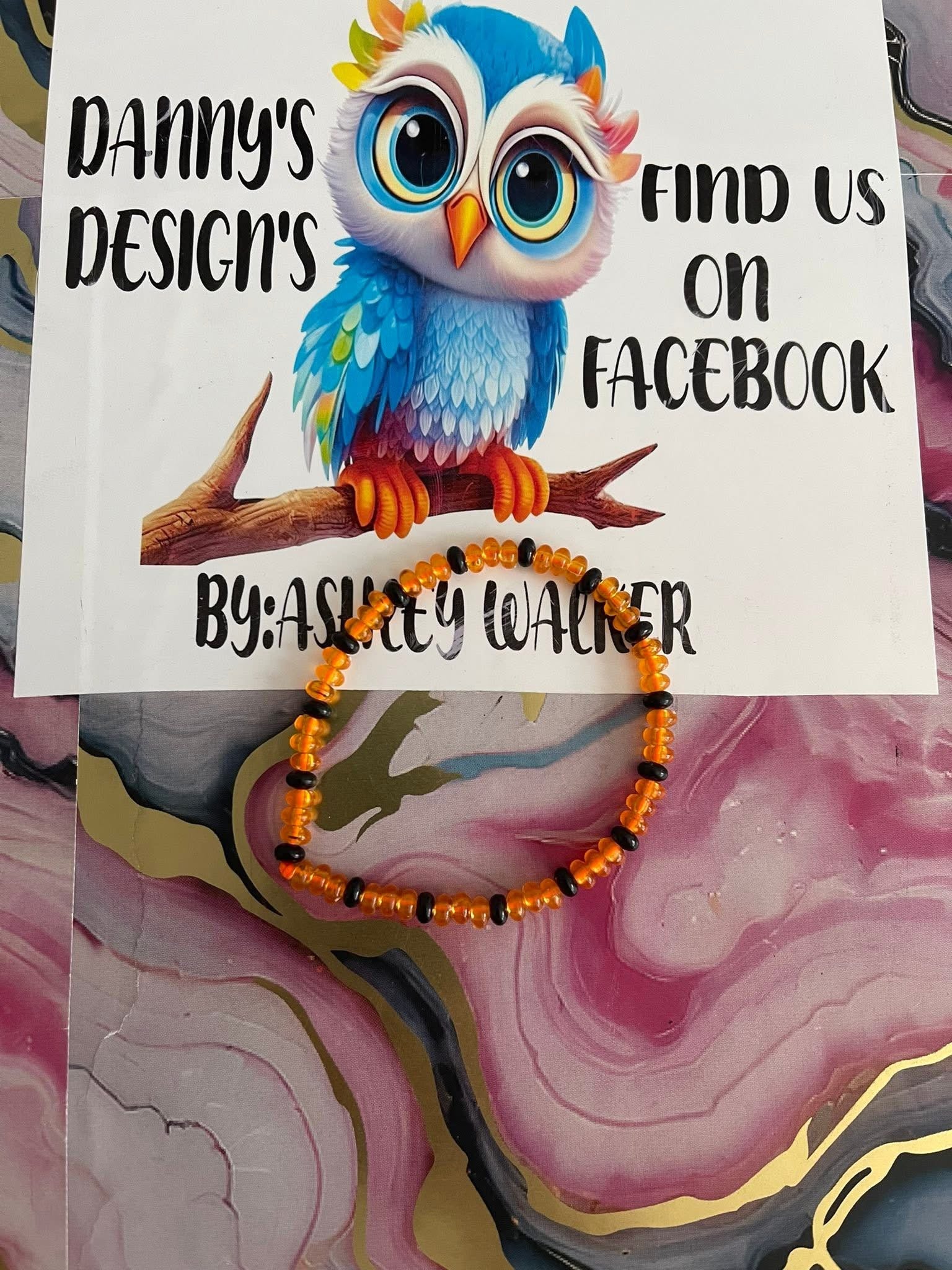 #135 Orange & Black Bracelet